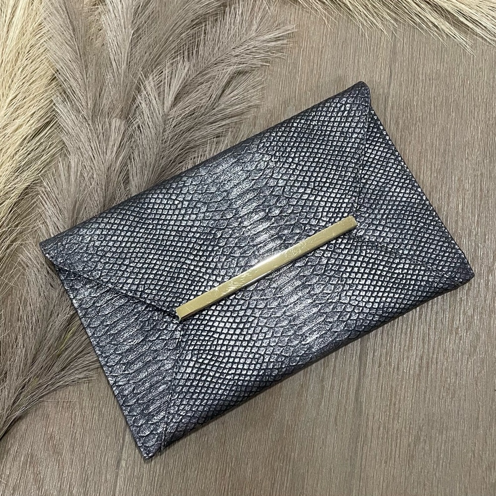 Elegant Snakeskin Black Clutch with Gold Accent